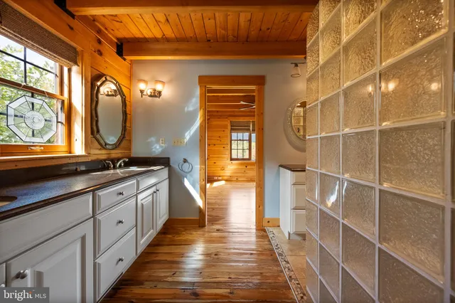 a bedroom with a bed and a large cabinets