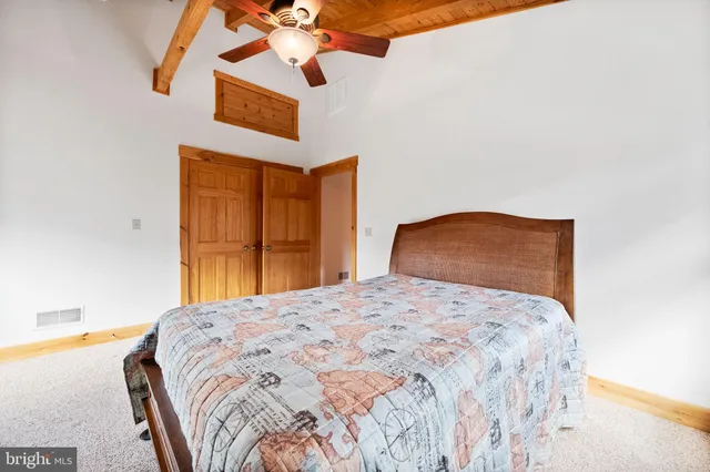 a view of a balcony with wooden floor