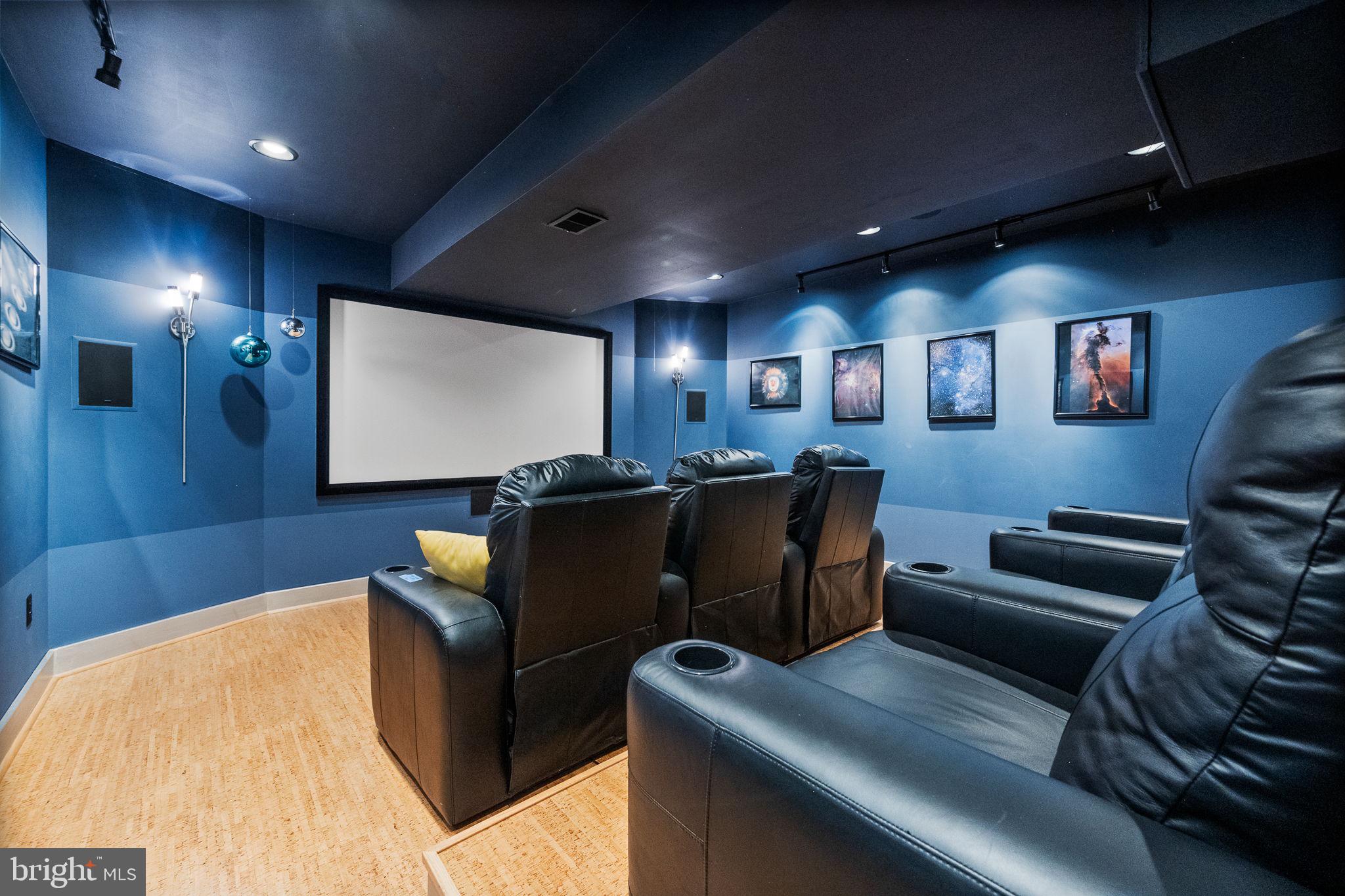 447 Fable Road Hedgesville, WV 25427 - Photo 49 of 81 a living room with furniture and a projector