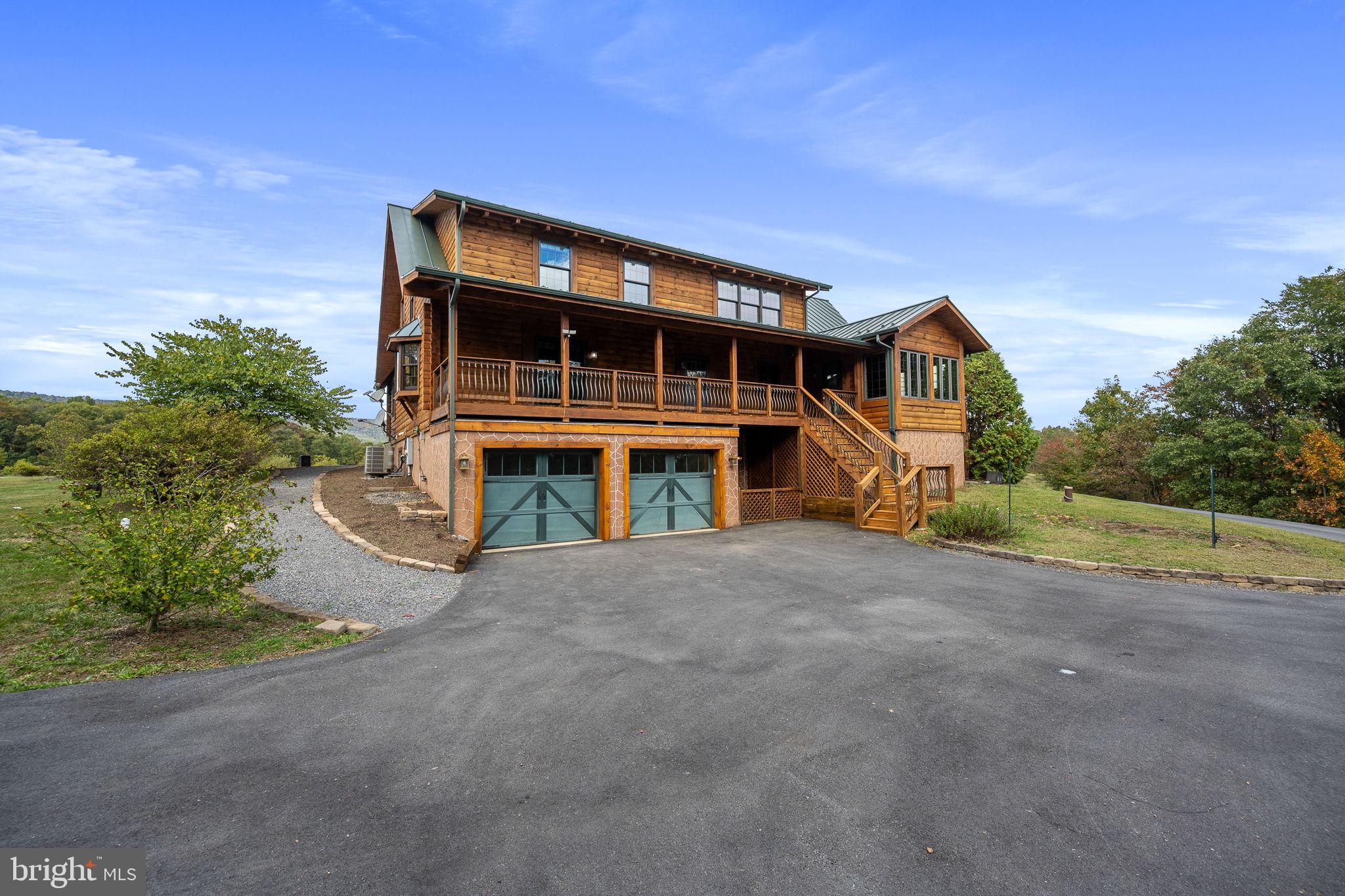 447 Fable Road Hedgesville, WV 25427 - Photo 53 of 81 a front view of a house with a yard