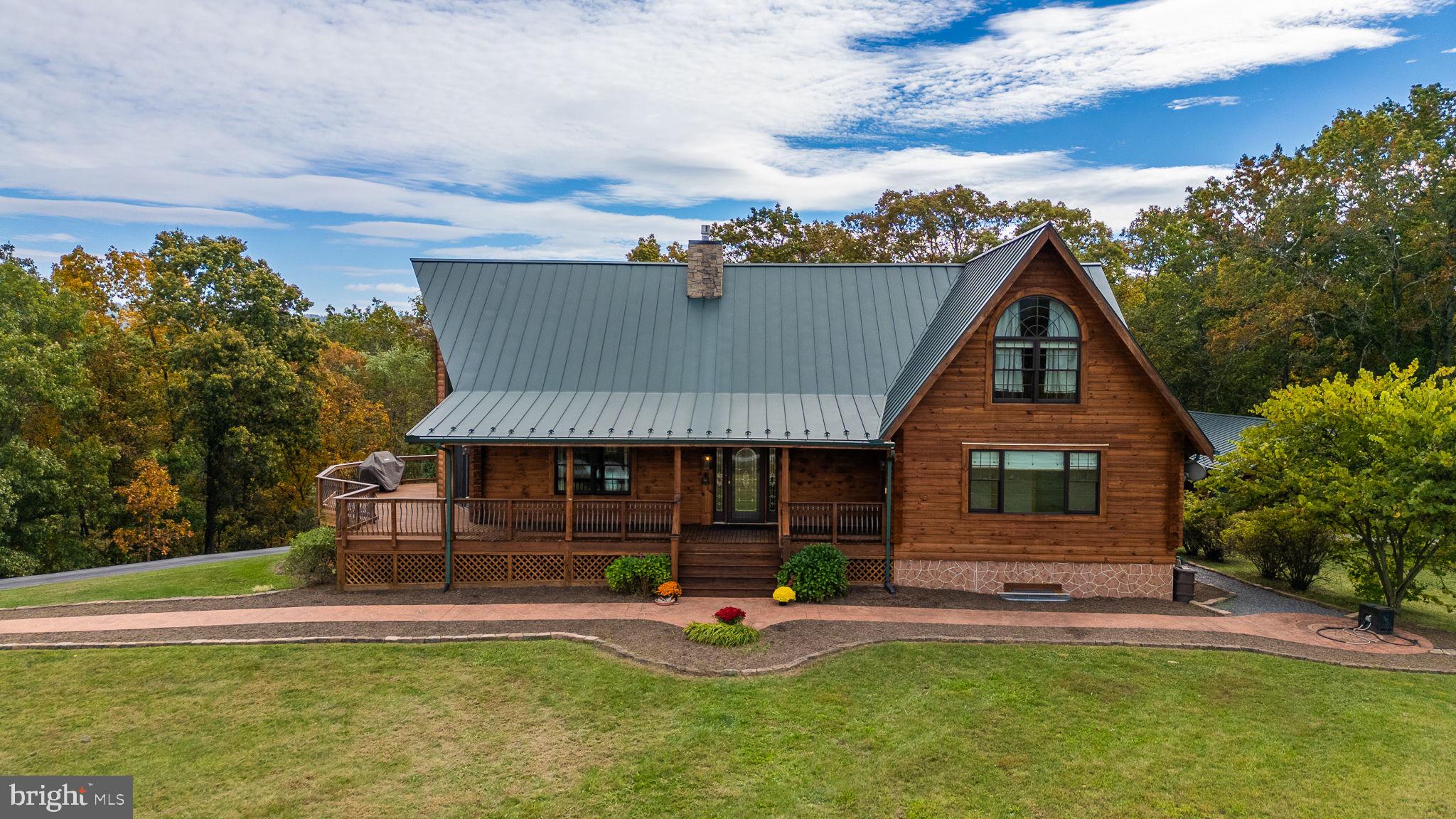 447 Fable Road Hedgesville, WV 25427 - Photo 64 of 81 front view of a house with a yard