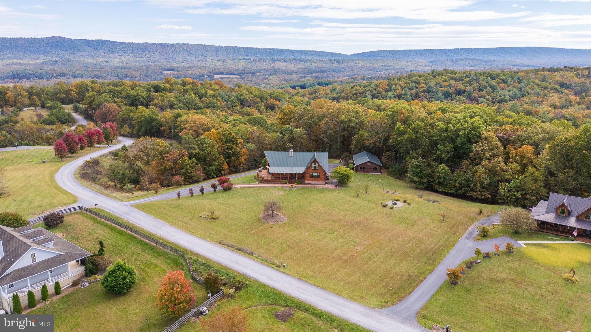 447 Fable Road Hedgesville, WV 25427 - Photo 73 of 81 a view of a swimming pool and mountains in the background