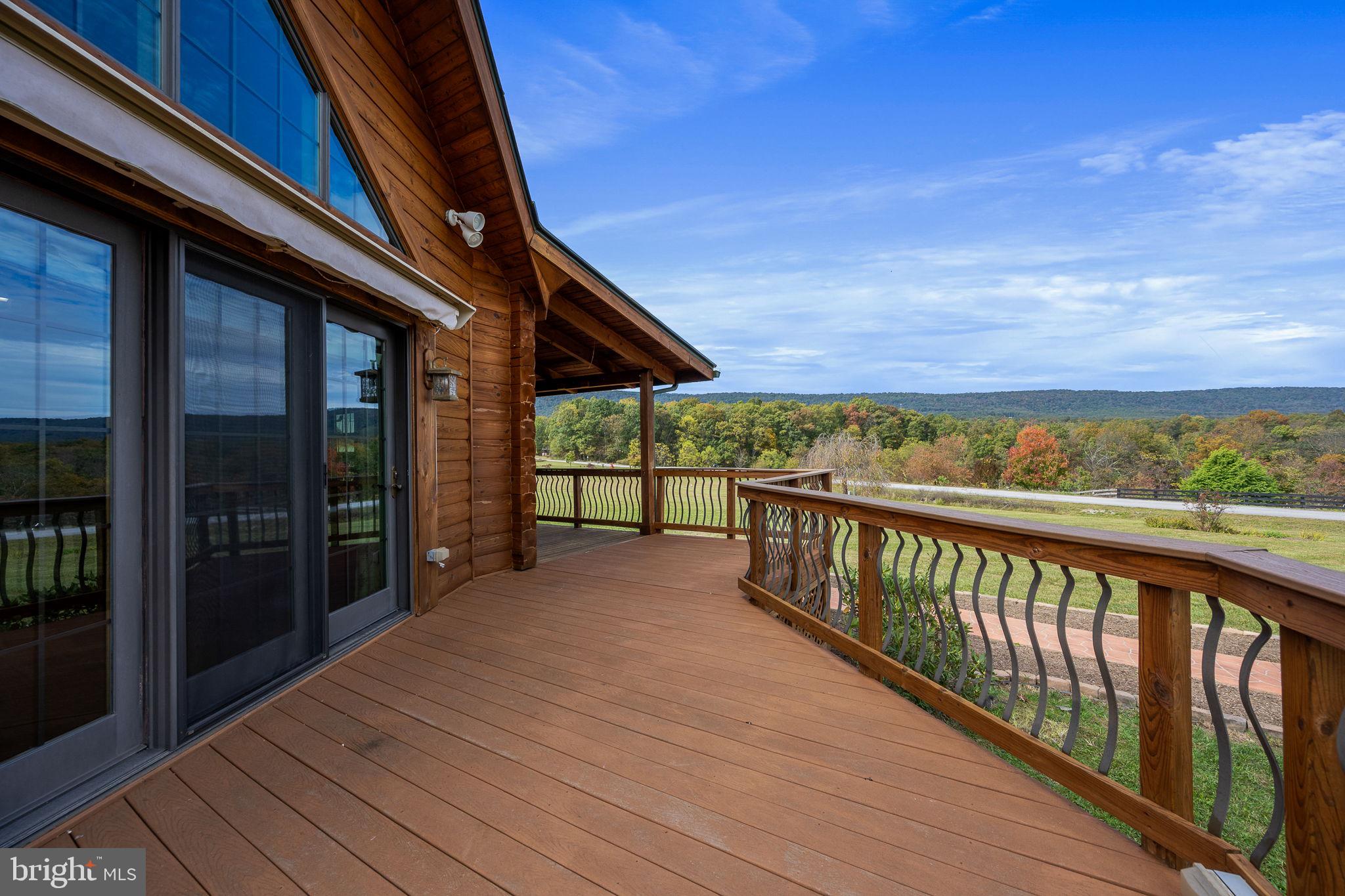 447 Fable Road Hedgesville, WV 25427 - Photo 9 of 81 a view of balcony with wooden floor and fence