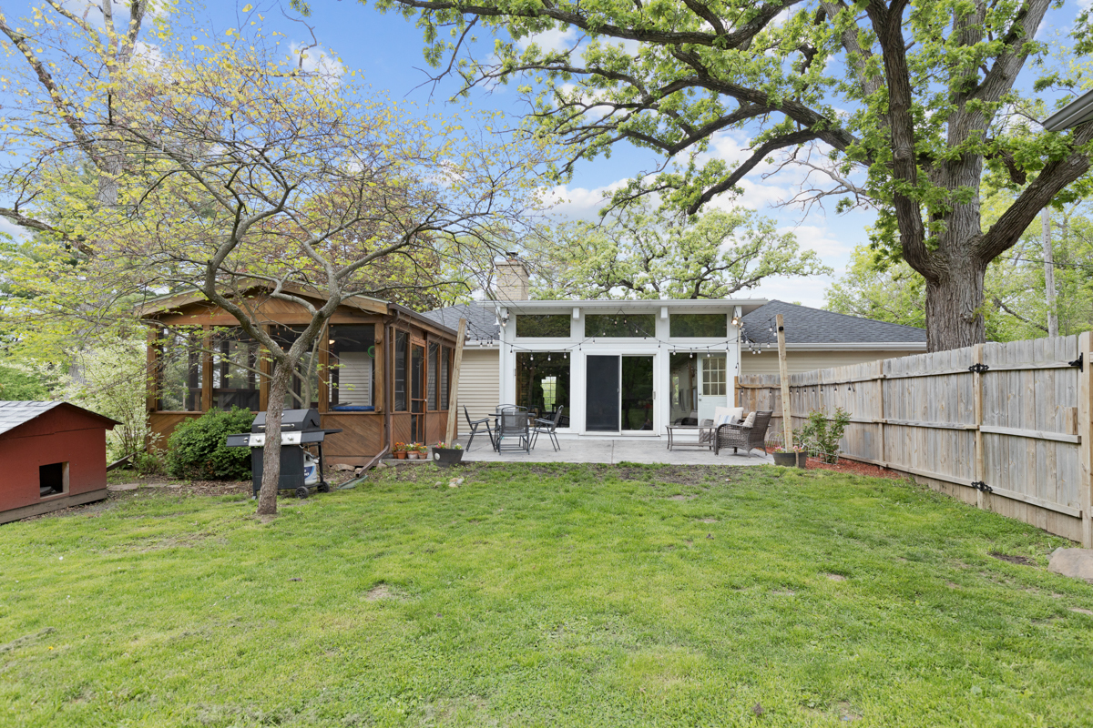 4604 Sunnyside Road Woodstock, IL 60098 - Photo 25 of 37 a view of a house with a yard porch and sitting area