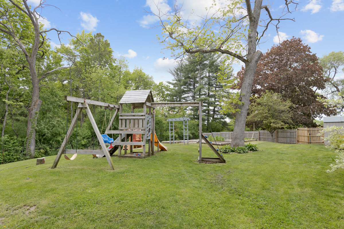 4604 Sunnyside Road Woodstock, IL 60098 - Photo 27 of 37 a view of a park with a slide