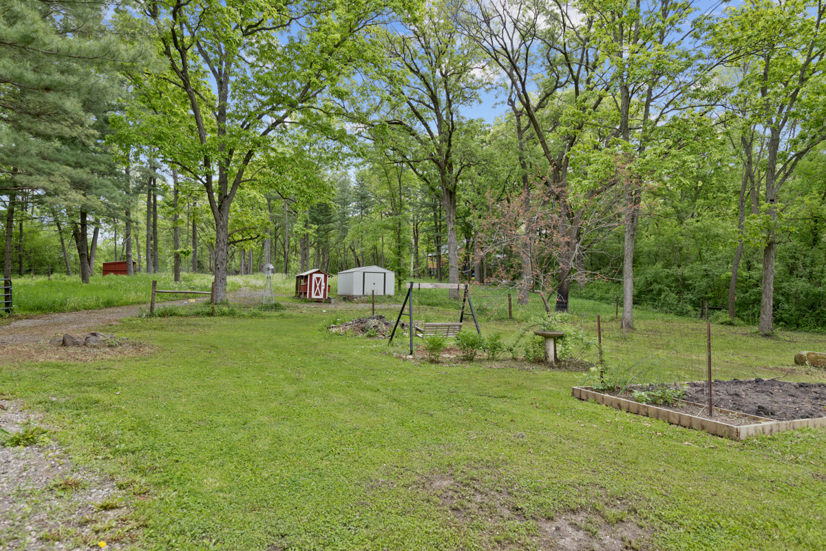 4604 Sunnyside Road Woodstock, IL 60098 - Photo 34 of 37 a view of a park with large trees