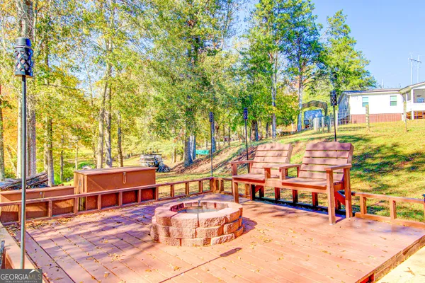a view of a swimming pool with a patio