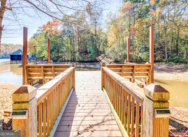 a view of swimming pool with seating space