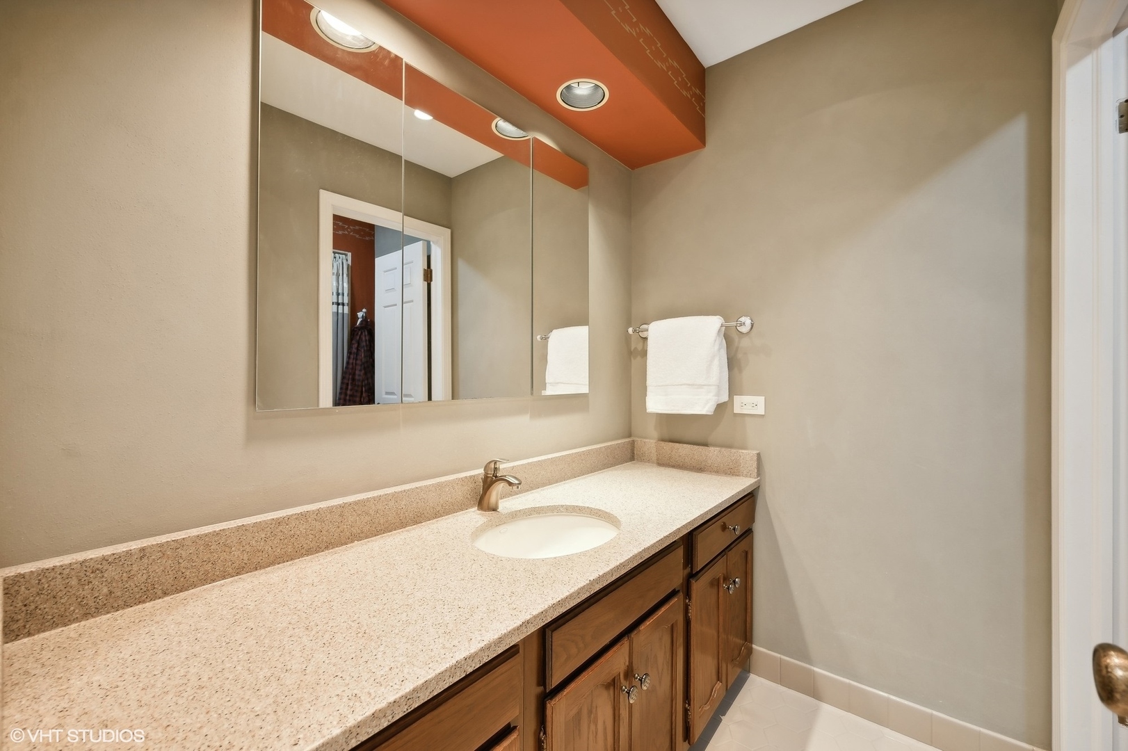 3110 Techny Road Northbrook, IL 60062 - Photo 16 of 21 a bathroom with a sink vanity and a mirror