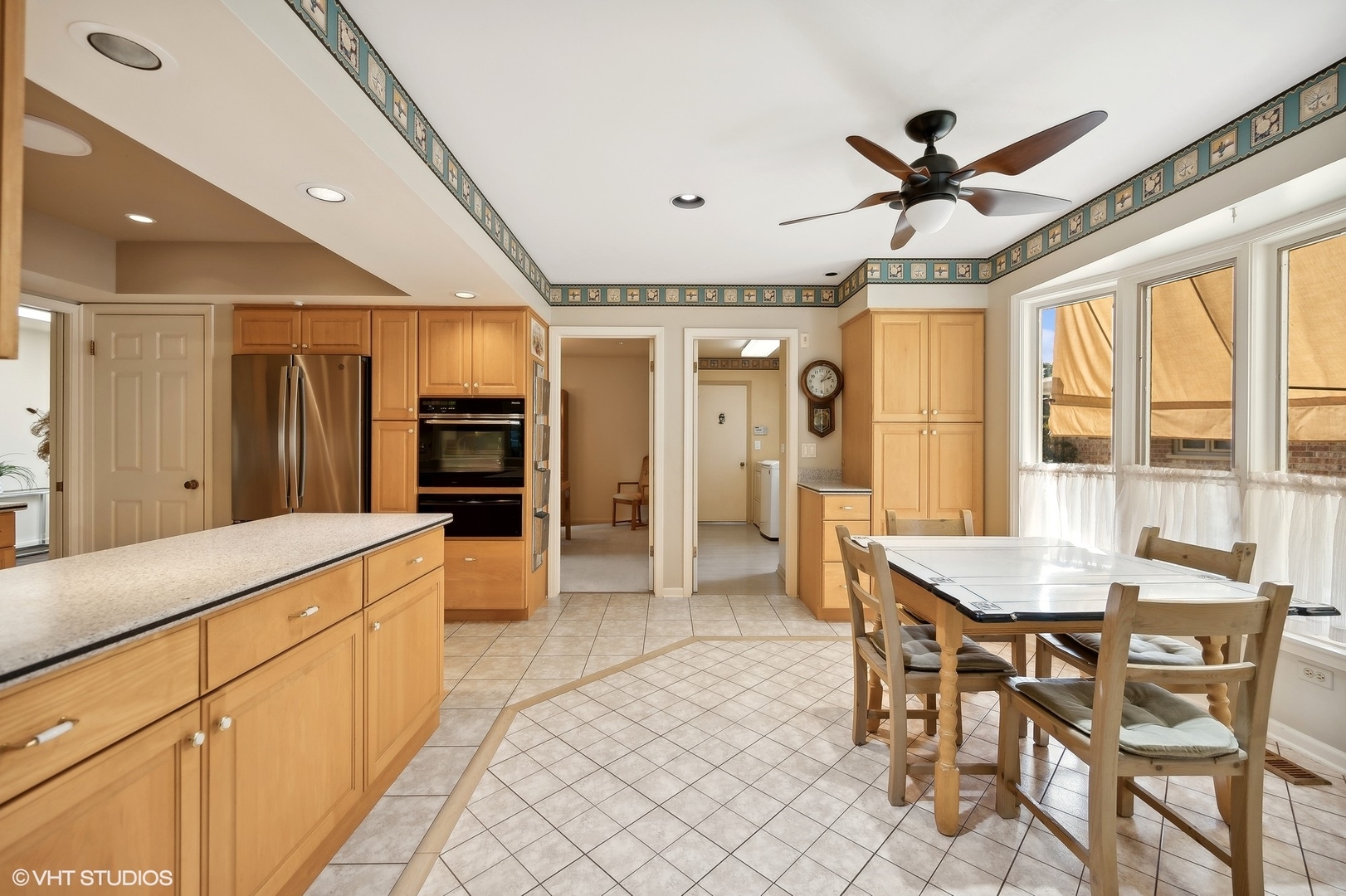 3110 Techny Road Northbrook, IL 60062 - Photo 9 of 21 a view of a dining room with furniture window and wooden floor