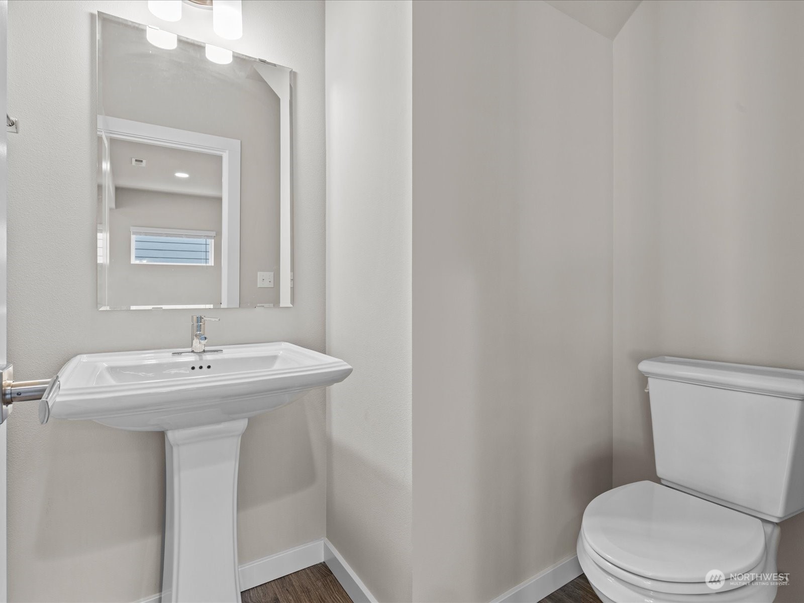 20713 42nd Avenue Southeast, Unit A Bothell, WA 98021 - Photo 12 of 32 a bathroom with a sink a toilet and mirror