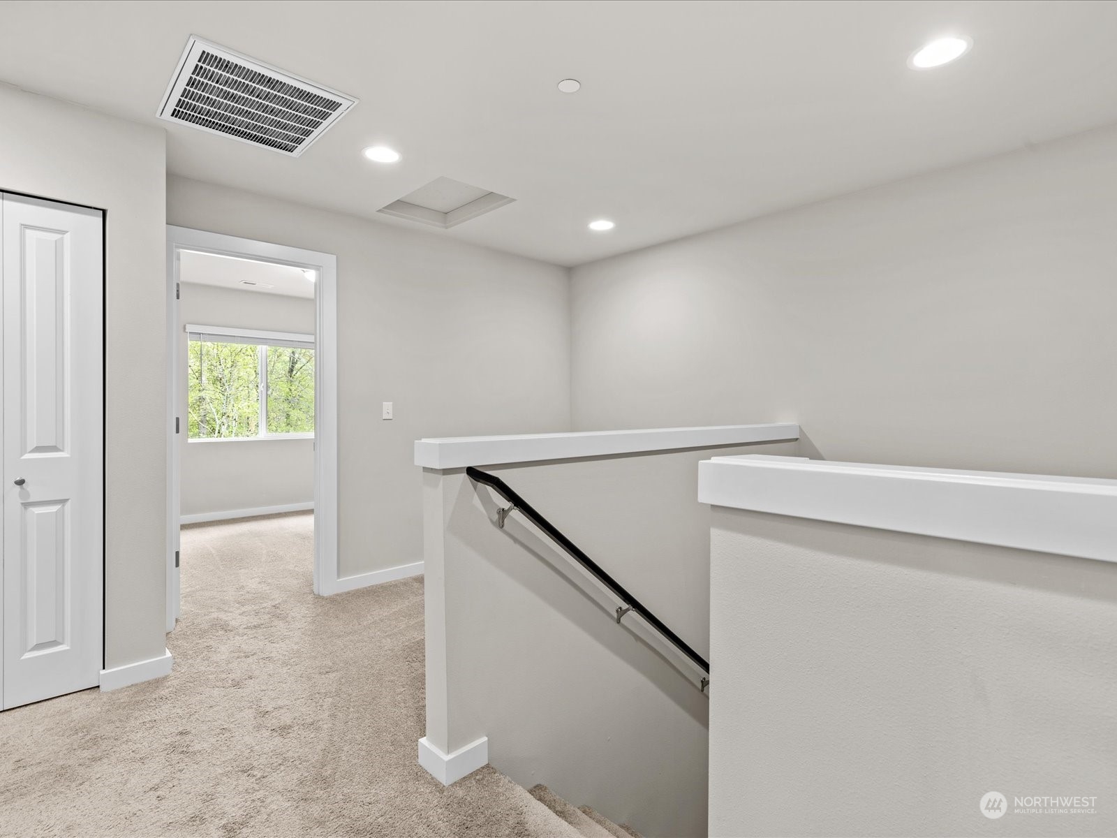 20713 42nd Avenue Southeast, Unit A Bothell, WA 98021 - Photo 20 of 32 a view of hallway with stairs and wooden floor