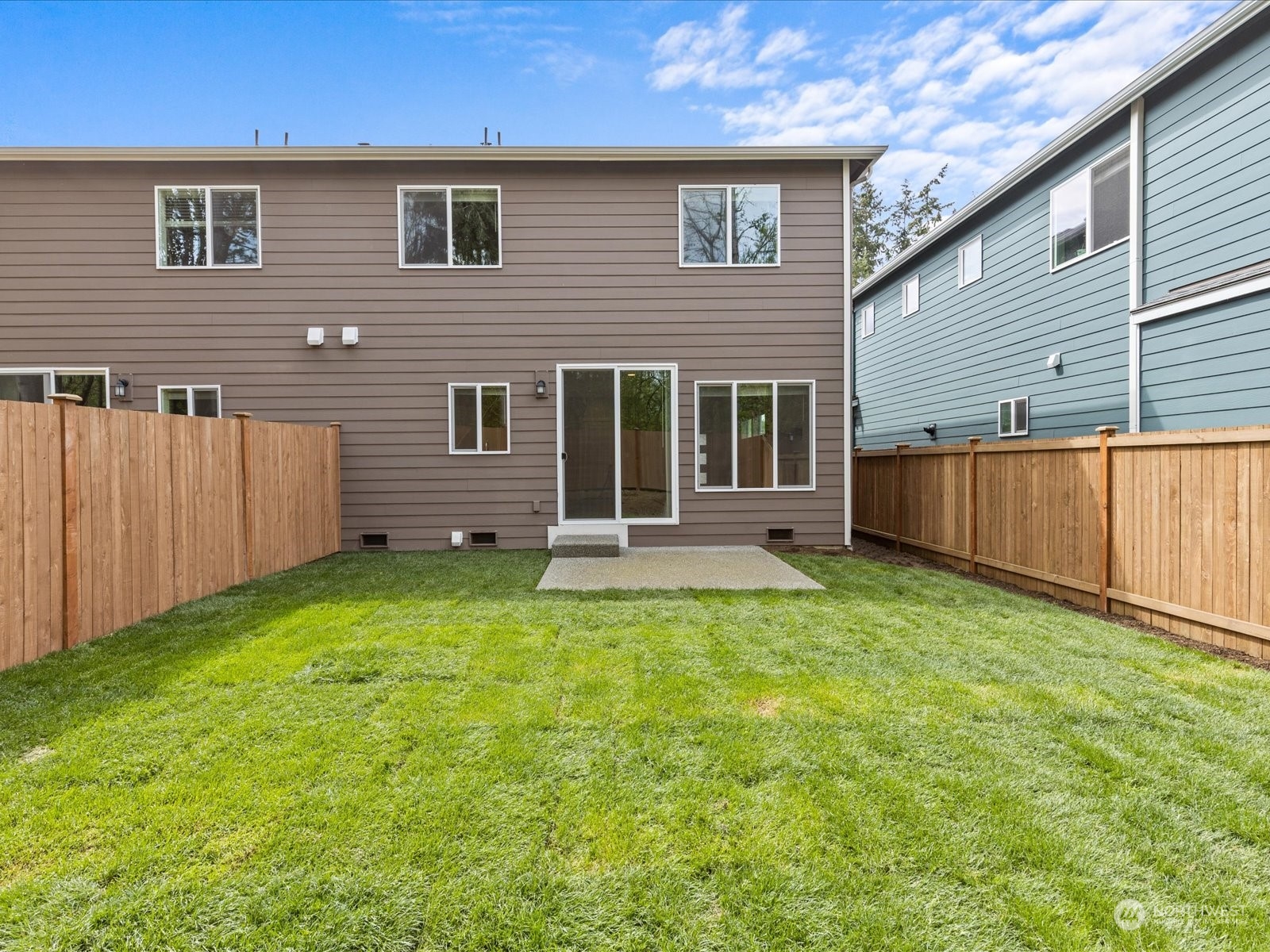 20713 42nd Avenue Southeast, Unit A Bothell, WA 98021 - Photo 29 of 32 a view of a house with backyard and porch