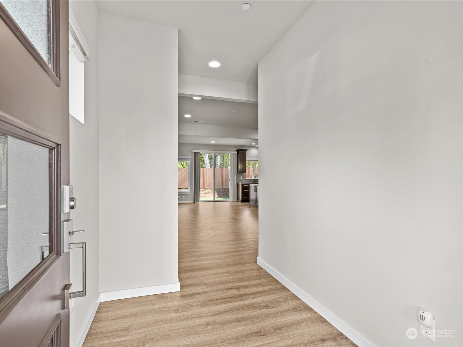 20713 42nd Avenue Southeast, Unit A Bothell, WA 98021 - Photo 8 of 32 a view of a hallway with wooden floor