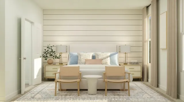 a large white room with a chair and table