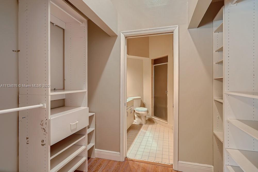 23060 Aqua, Unit 8 Boca Raton, FL 33433 - Photo 27 of 33 a view of walk in closet