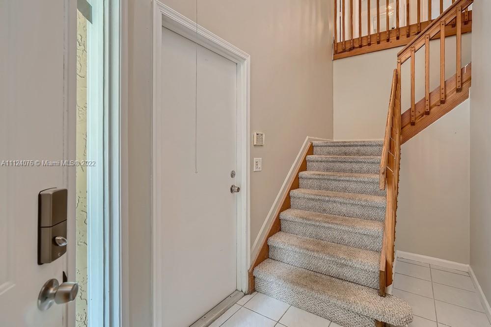 23060 Aqua, Unit 8 Boca Raton, FL 33433 - Photo 4 of 33 a view of entryway