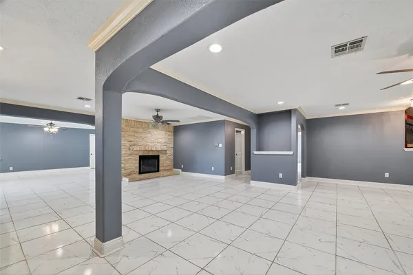 a view of a hallway with a livingroom