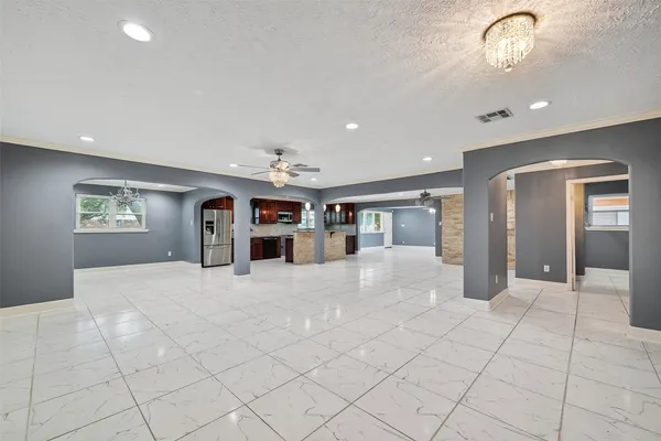 a view of an empty room and window