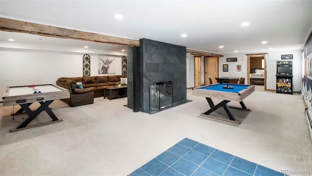 a living room with furniture and a table