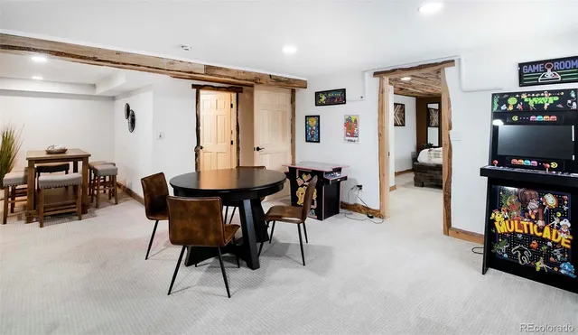 a view of a livingroom with furniture and a flat screen tv