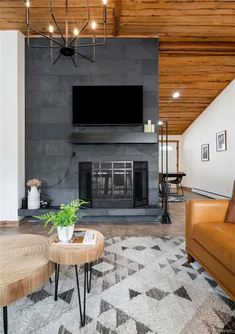 a view of a patio with a table and chairs