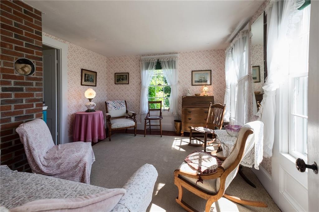 119 Davis Point Road Cushing, ME 04563 - Photo 18 of 34 Crisp white curtains let the...