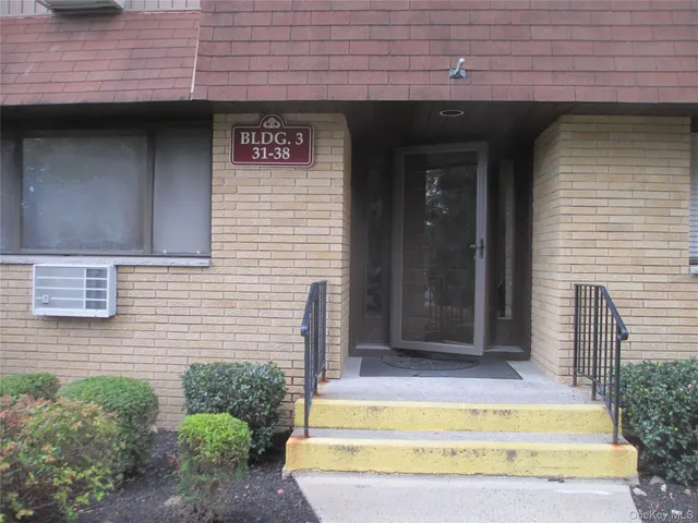 a view of entrance gate of a house