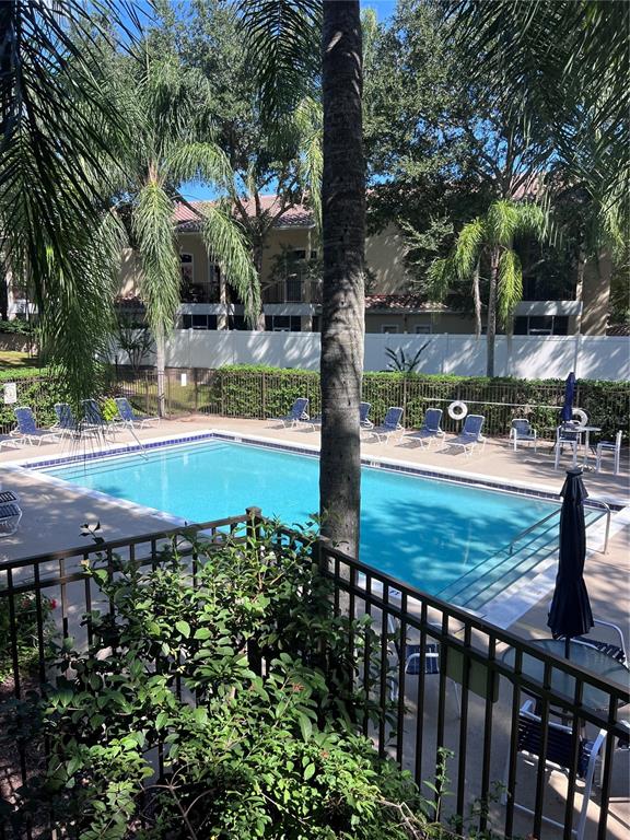 643 Dory Lane, Unit 202 Altamonte Springs, FL 32714 - Photo 12 of 14 a view of a backyard with sitting area