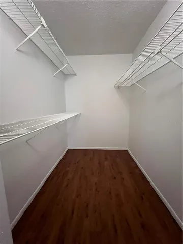 a view of a room with racks on the wall