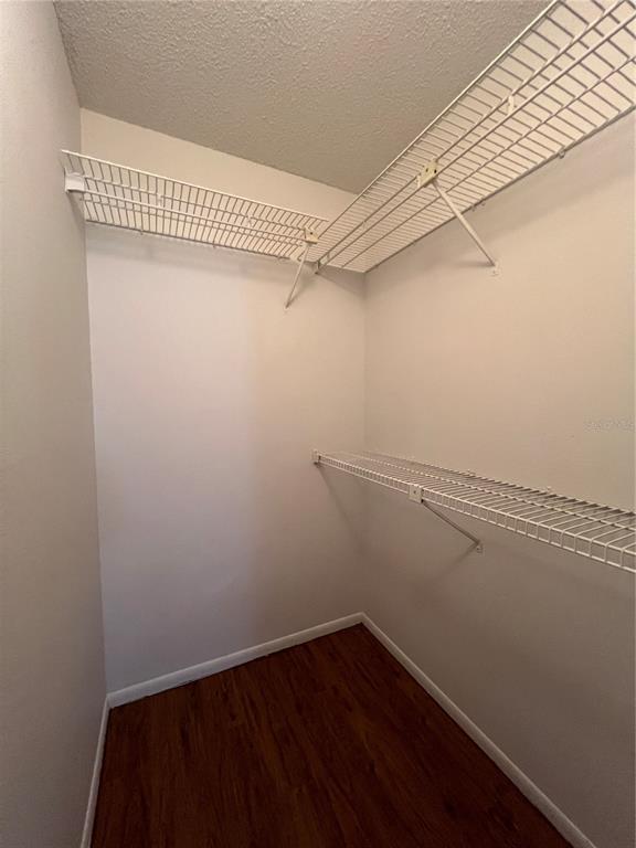 643 Dory Lane, Unit 202 Altamonte Springs, FL 32714 - Photo 9 of 14 a view of a room with racks on the wall