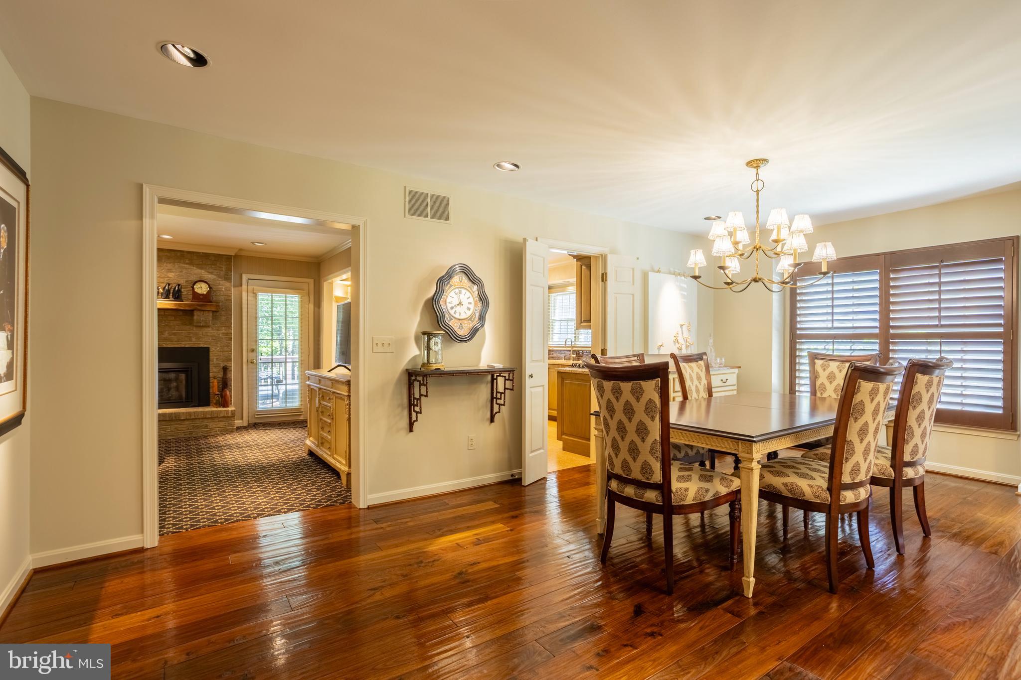 63 Raisin Tree Circle Baltimore, MD 21208 - Photo 13 of 57 a view of a dining room with furniture and wooden floor