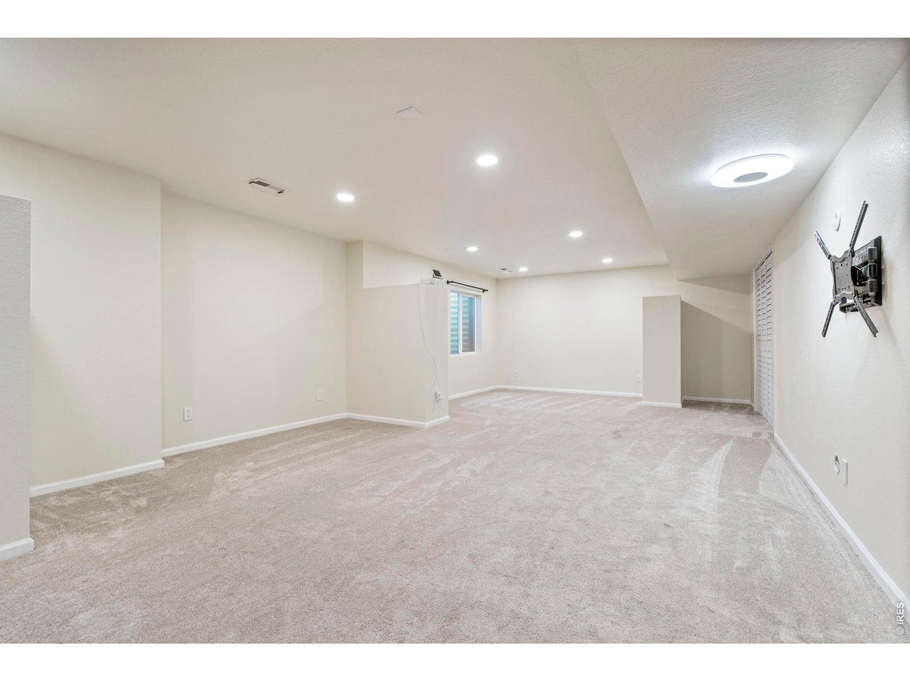 10080 Cedar Street Firestone, CO 80504 - Photo 32 of 38 Large, open basement living area to configure as you desire