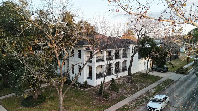 a view of a building with a yard