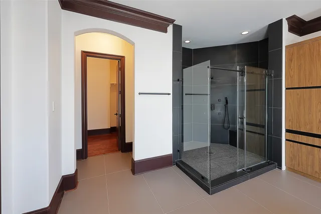 a view of a bathroom with a glass door