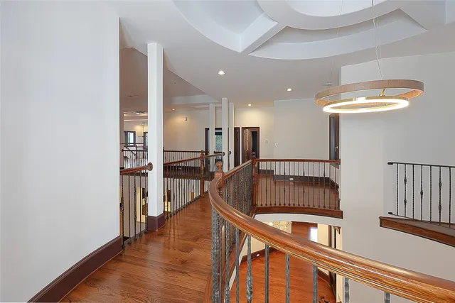 a view of entryway with wooden floor