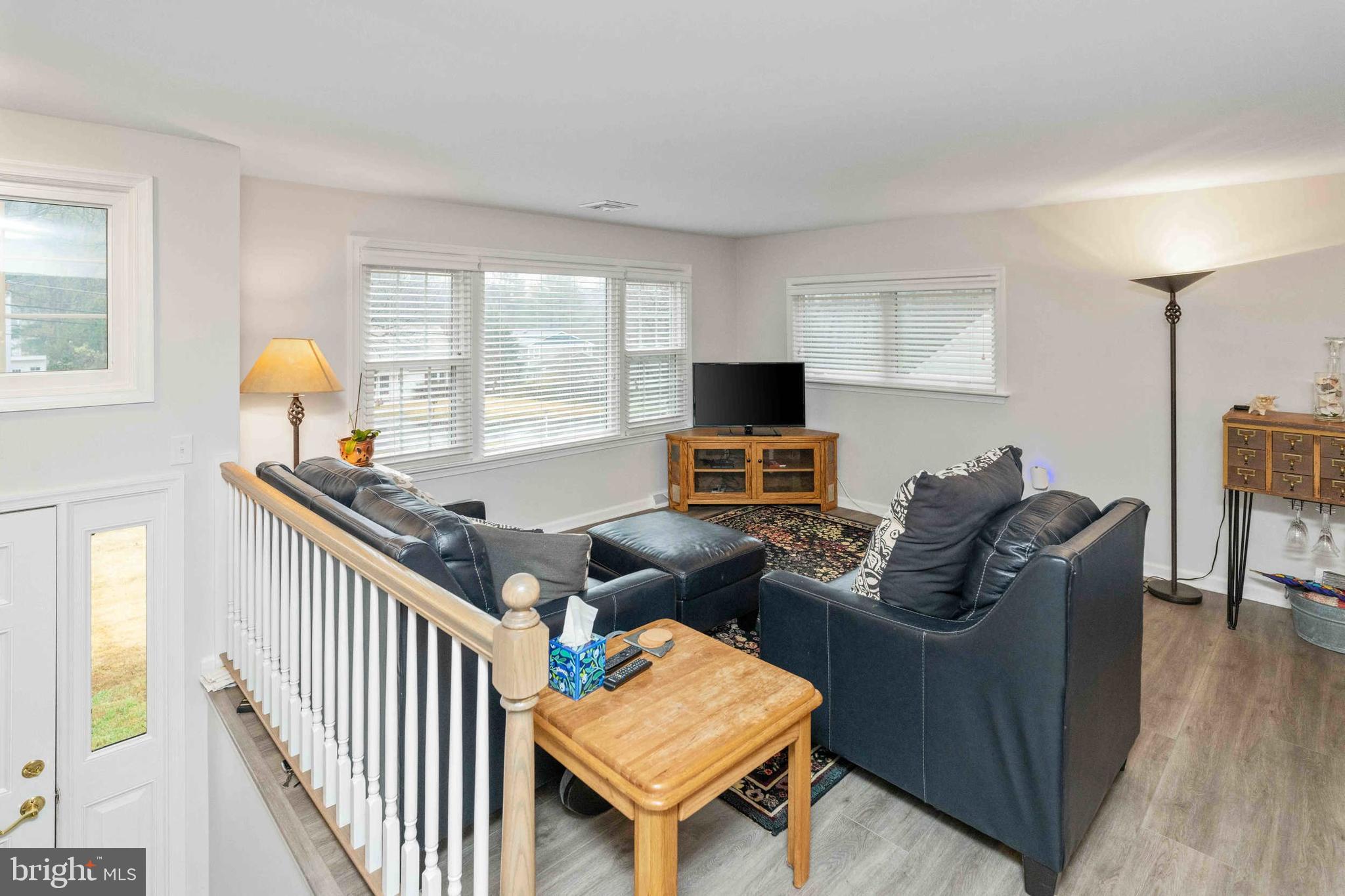 472 Woodward Drive Huntingdon Valley, PA 19006 - Photo 4 of 27 a living room with furniture and a flat screen tv