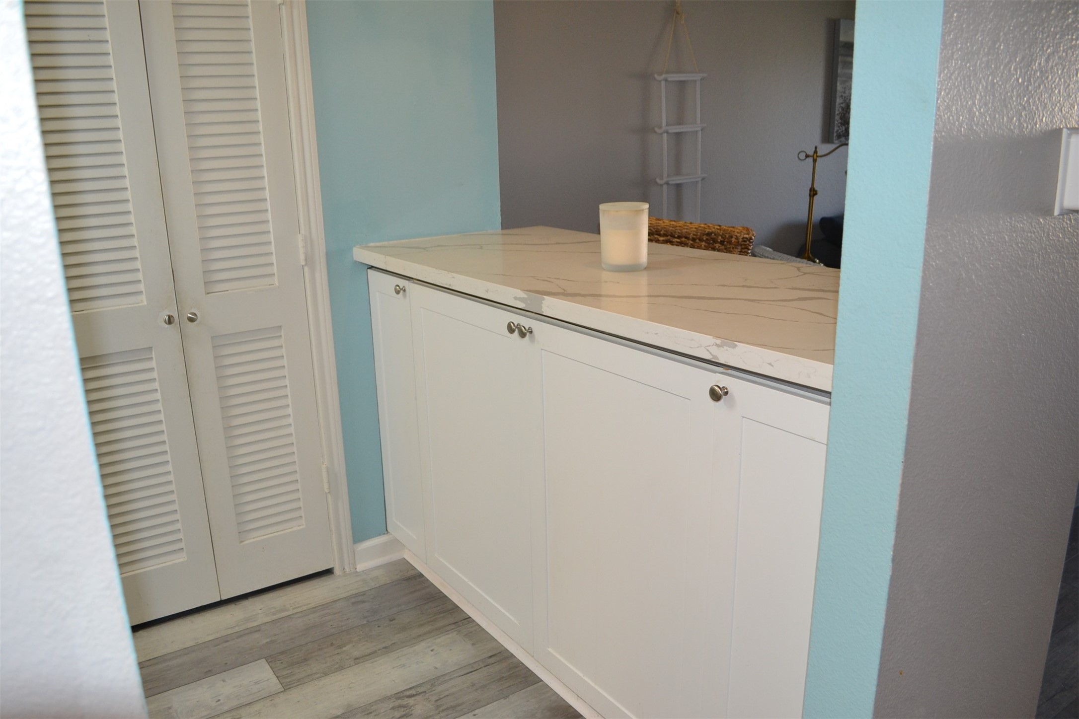102 Lakeview Terrace, Unit D Conroe, TX 77356 - Photo 17 of 44 a bathroom with a sink and a mirror