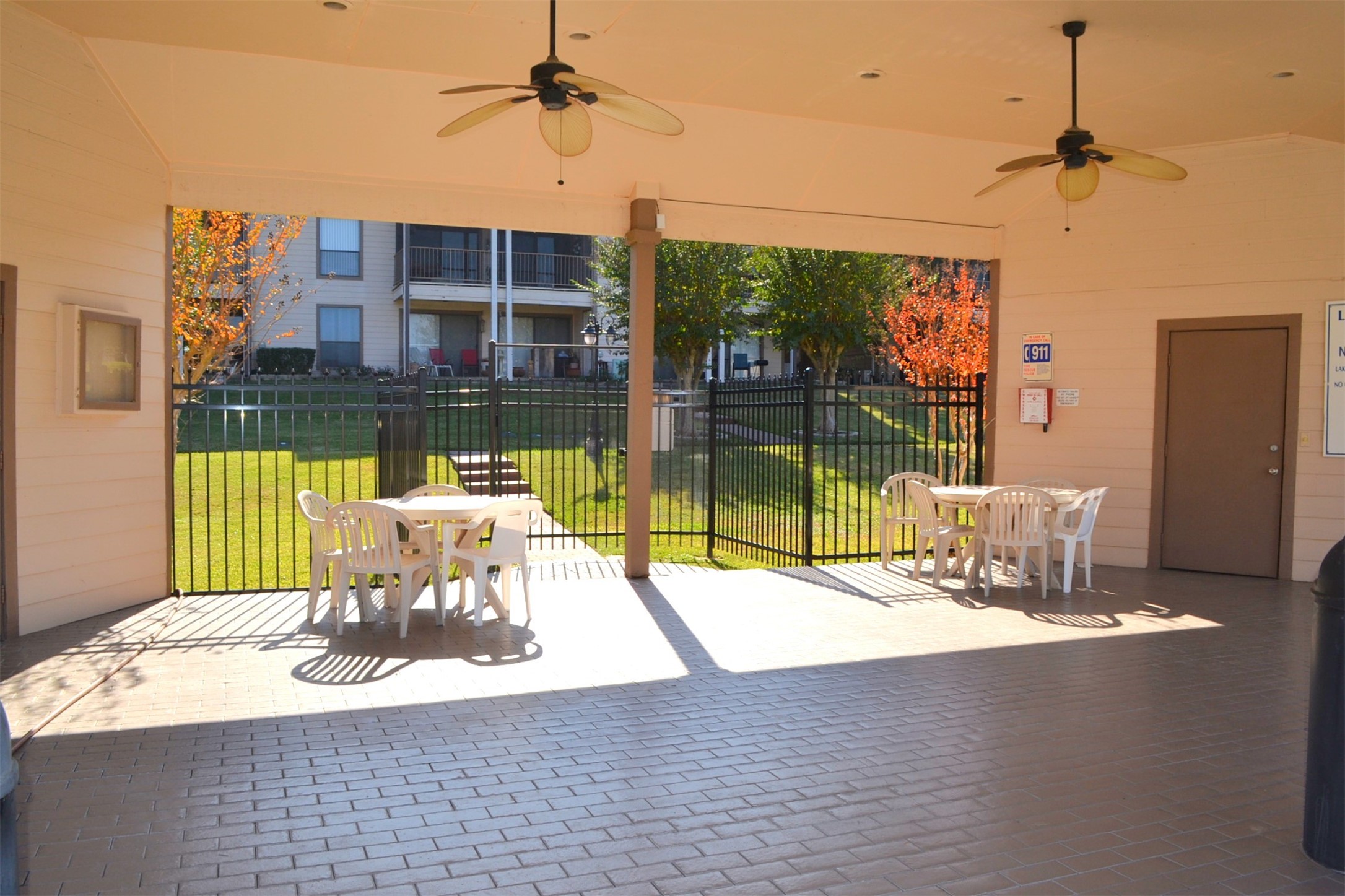 102 Lakeview Terrace, Unit D Conroe, TX 77356 - Photo 43 of 44 a living room with a large window and a table