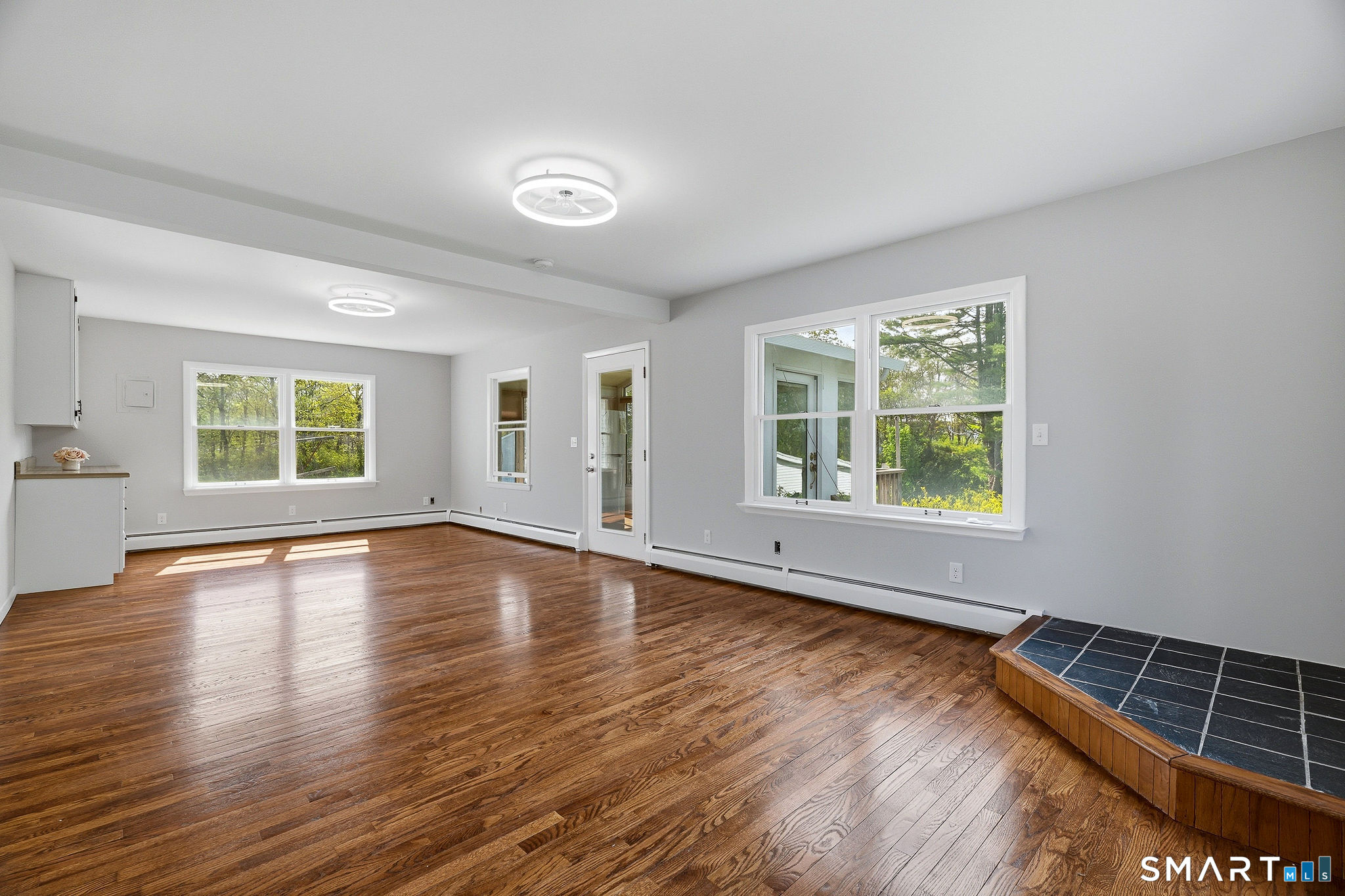 21 Tower Avenue Groton, CT 06340 - Photo 20 of 39 Family room off back of house with sun room