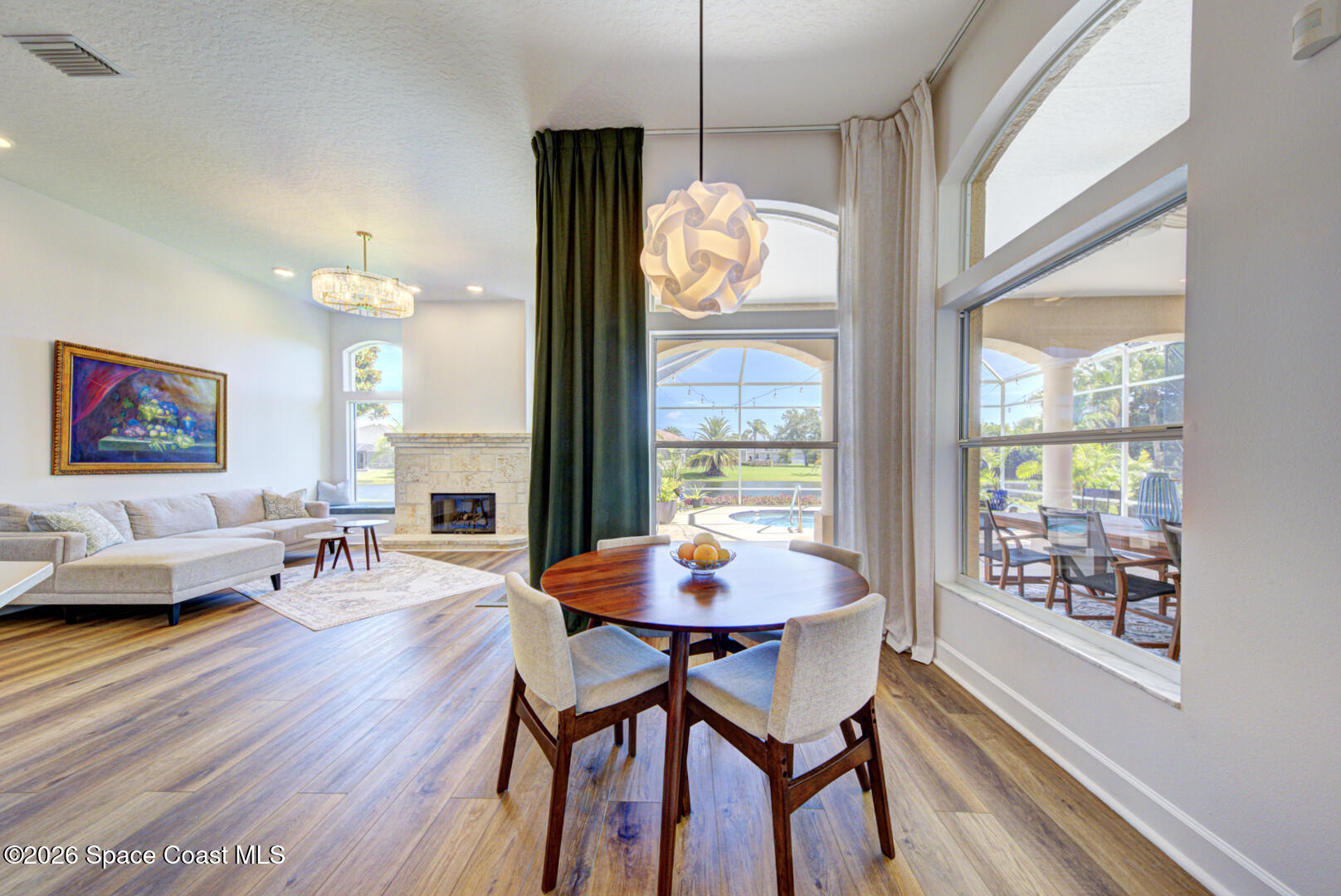 4070 Stoney Point Road Melbourne, FL 32940 - Photo 20 of 78 breakfast nook open to family room