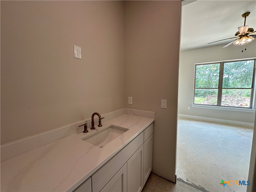 418 Dos Rios Drive Belton, TX 76513 - Photo 21 of 41 a bathroom with a sink and a vanity
