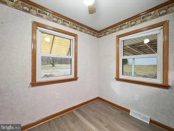 a view of a hallway with front door