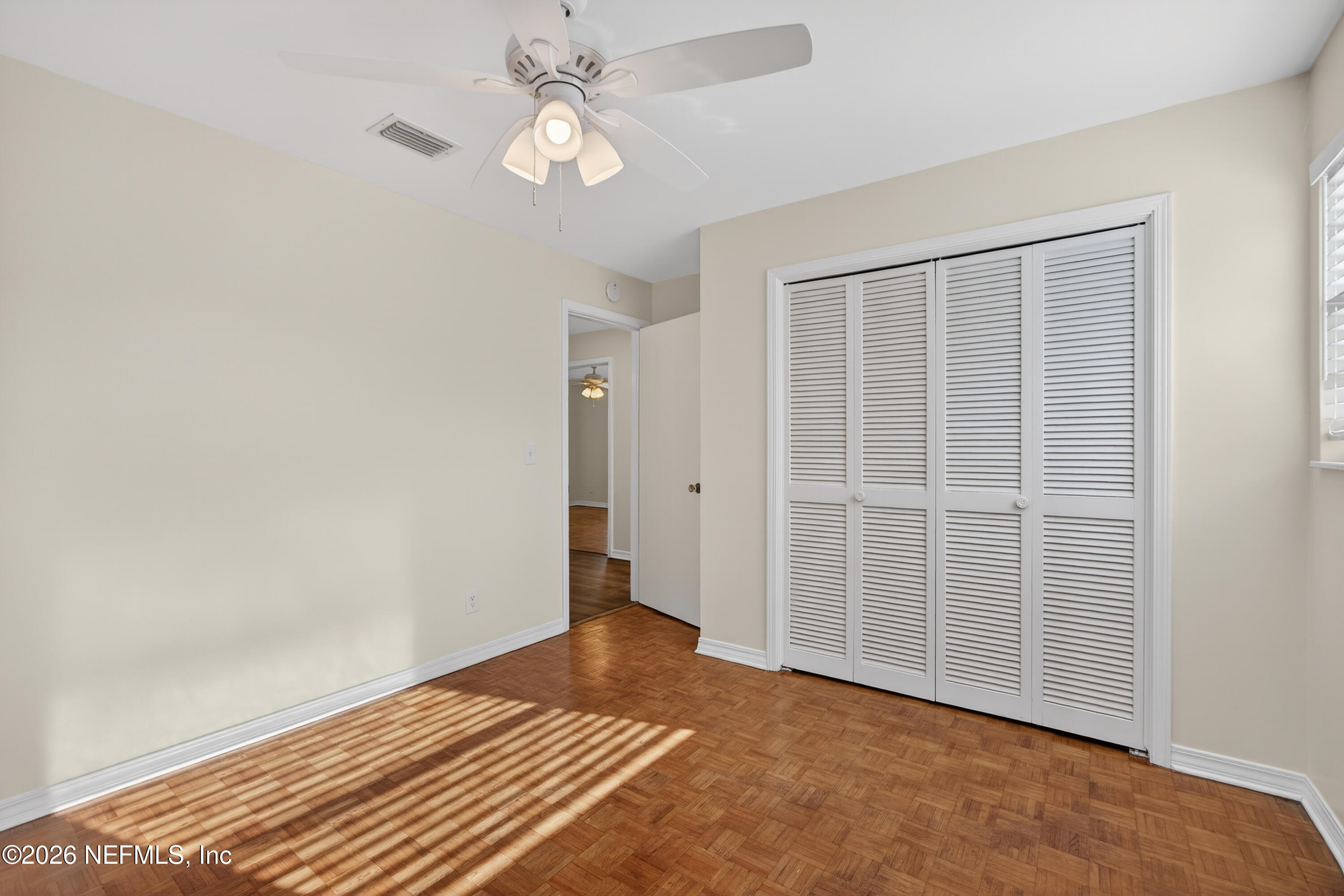 2766 Greenridge Road Orange Park, FL 32073 - Photo 19 of 30 wooden floor in an empty room with a window