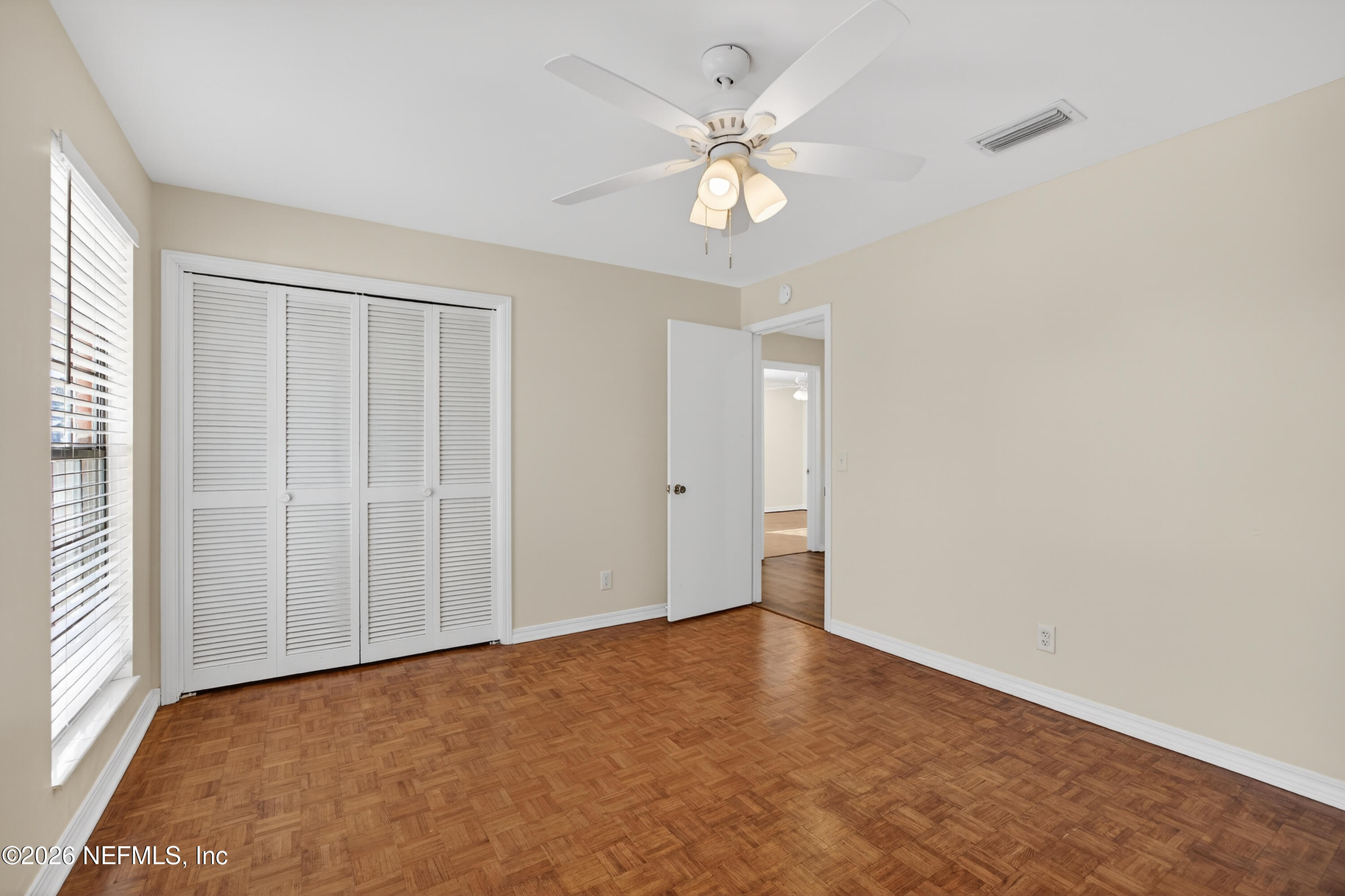 2766 Greenridge Road Orange Park, FL 32073 - Photo 24 of 30 an empty room with chandelier fan
