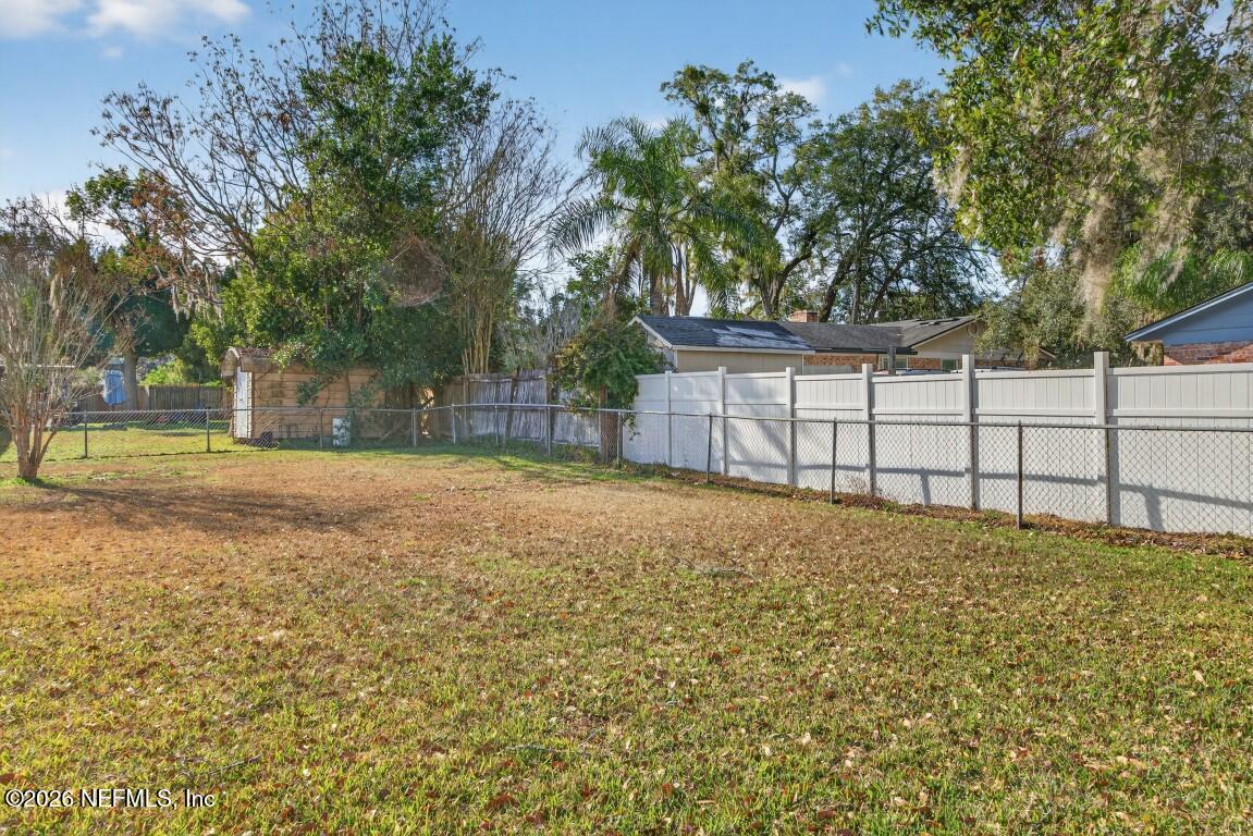 2766 Greenridge Road Orange Park, FL 32073 - Photo 27 of 30 a view of backyard and tree