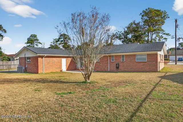 a house view with a yard space