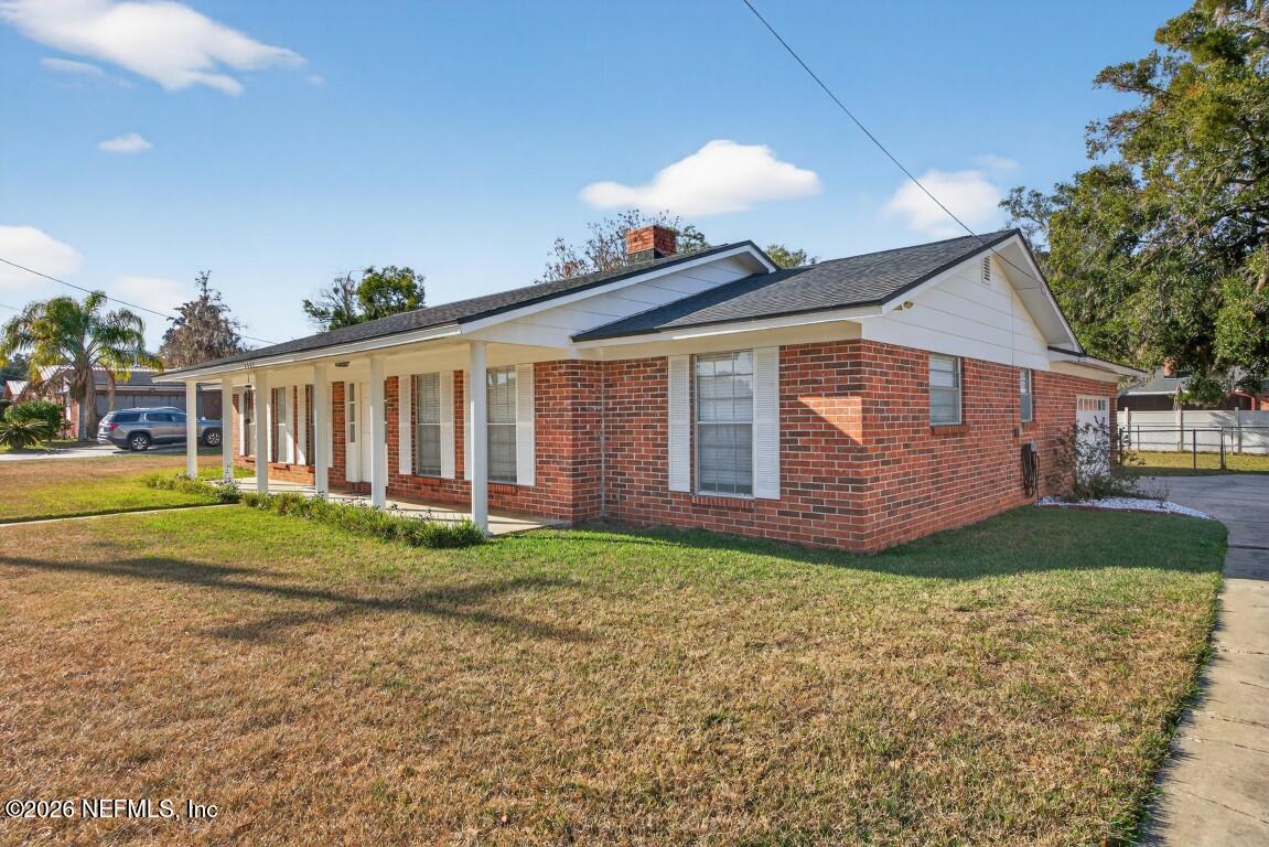 2766 Greenridge Road Orange Park, FL 32073 - Photo 4 of 30 a front view of a house with garden