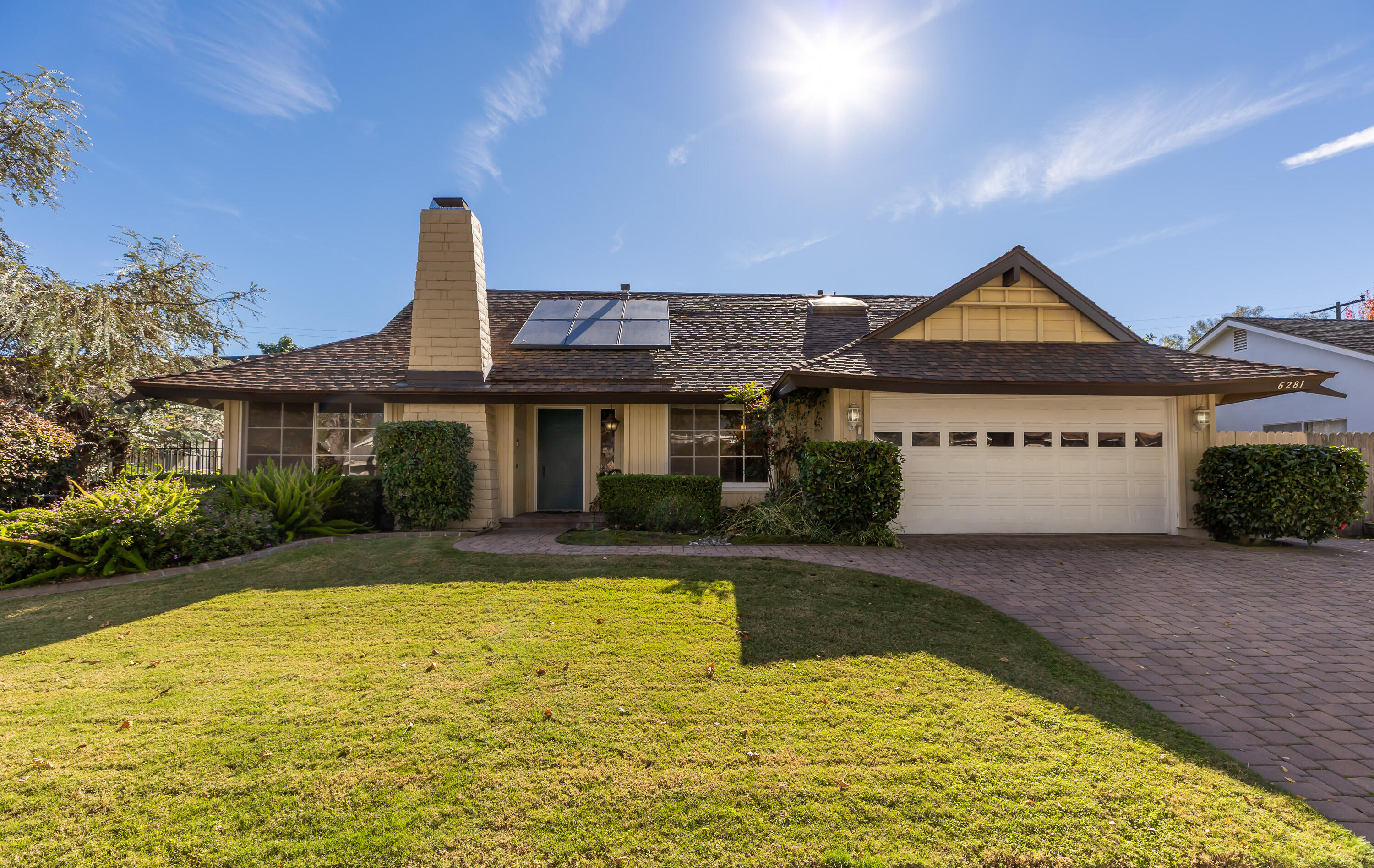 a front view of a house with swimming pool