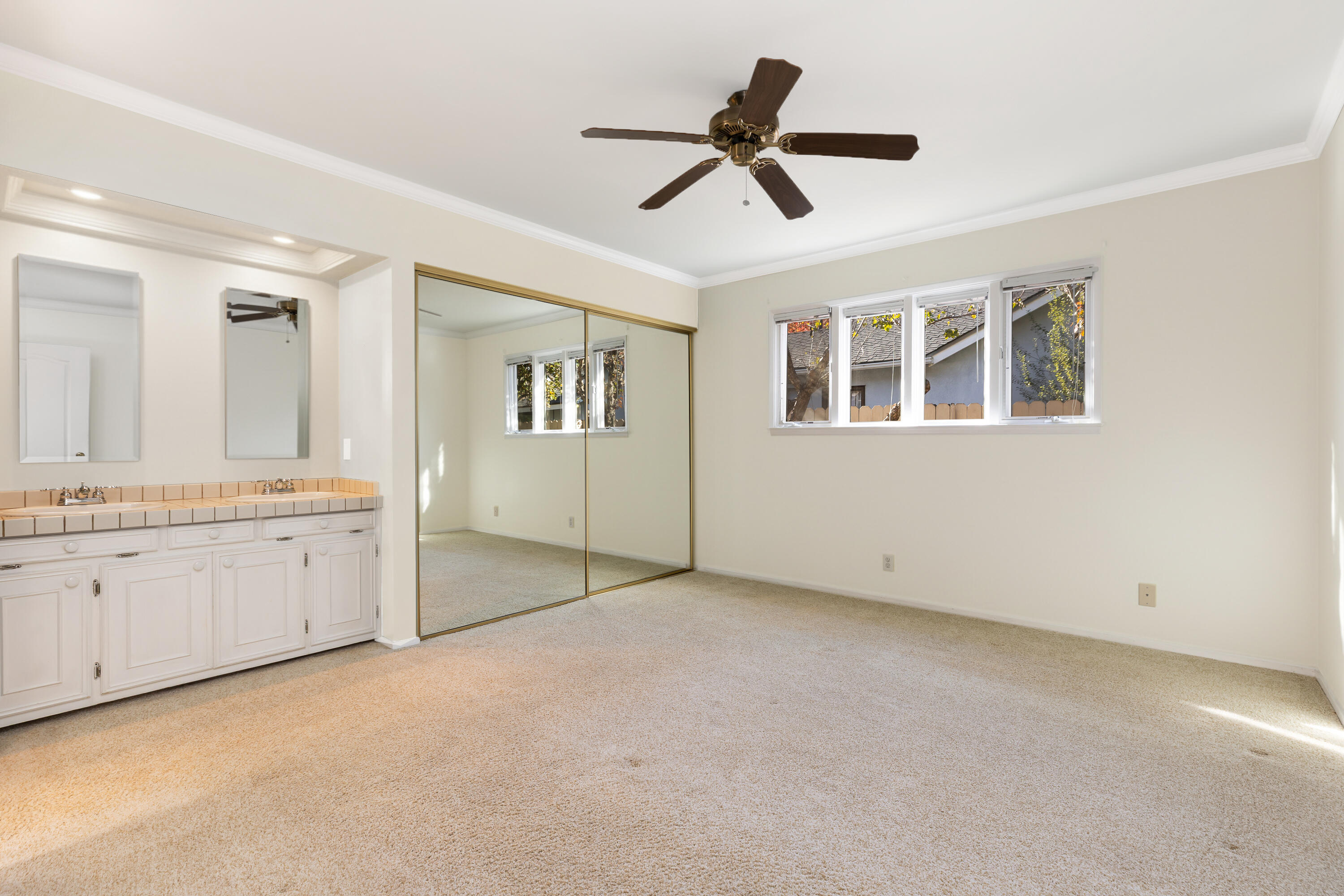 6281 Covington Way Goleta, CA 93117 - Photo 12 of 31 a view of room with hardwood ceiling fan and windows